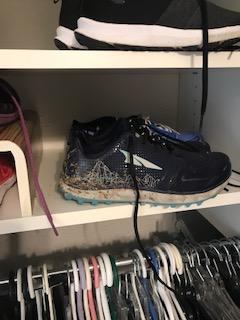 trail shoes sitting proudly in closet